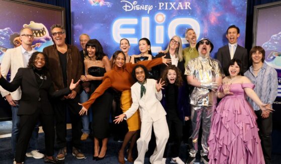 From left to right, Pete Docter, CCO, Pixar; Young Dylan; Brad Garrett; Jim Morris, President, Pixar; Jameela Jamil; Madeline Sharafian; Zoe Saldaña; Domee Shi; Yonas Kibreab; Mary Alice Drumm; Remy Edgerly; Rob Simonsen; Brendan Hunt; Brandon Moon; Naomi Watanabe; and Jake Getman attend the World Premiere of Disney and Pixar's "Elio"in Los Angeles, California, on June 10.