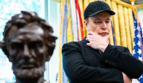 Elon Musk is seen near a bust of Abraham Lincoln during a news conference with President Donald Trump in the Oval Office of the White House on May 30.