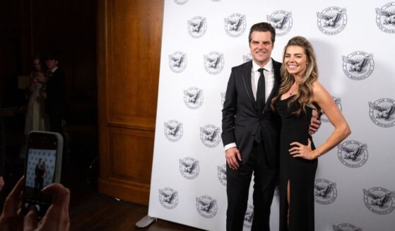 Former US Representative Matt Gaetz (L) and his wife Ginger Gaetz pose for a photograph as they attend the New York Young Republican Club's Annual Gala at Cipriani's Wall Street in New York City on December 15, 2024.